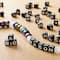 12 Pack: 1/2lb. Black Square Alphabet Beads by Creatology™, 6.5mm